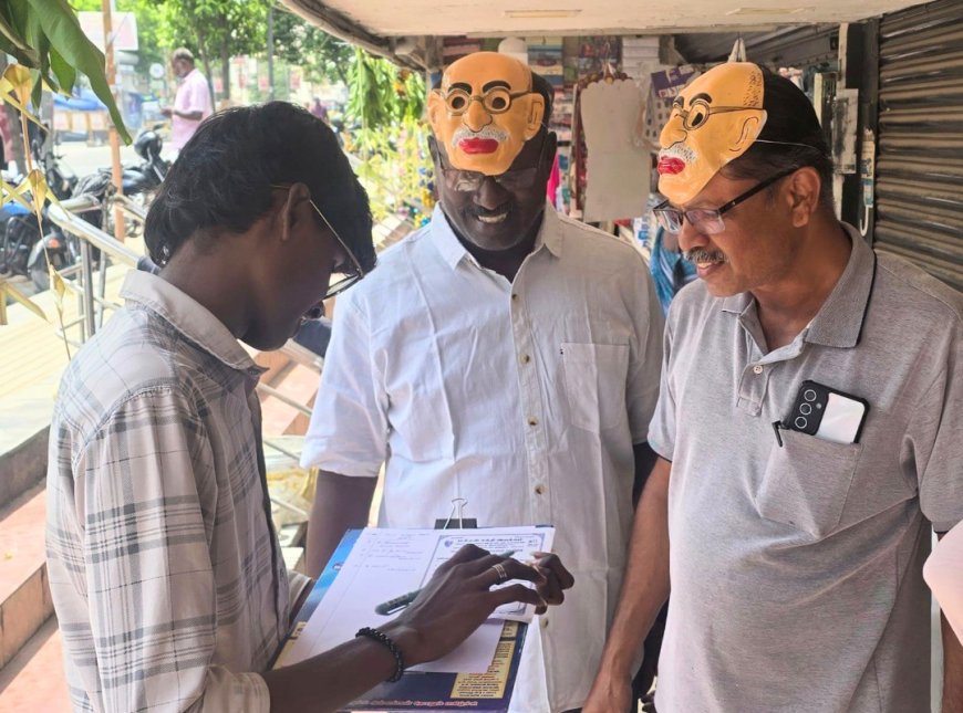 மக்கள் சக்தி இயக்கம் சார்பில் காந்தி முகமூடி அணிந்து மதுவுக்கு எதிராக கையெழுத்து இயக்கம்